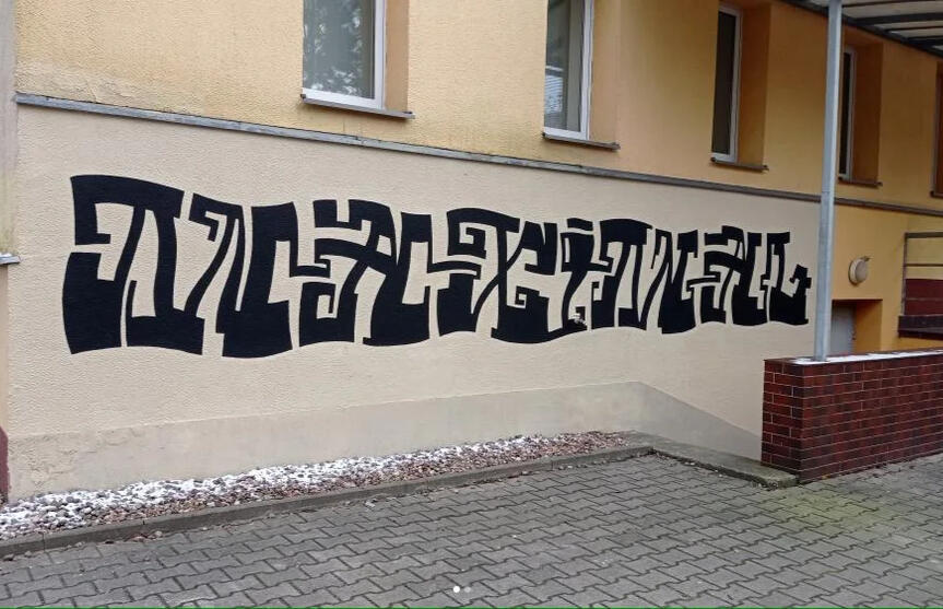 TYPO-MURAL "MAXIMAL" Z DEDYKACJĄ DLA WACŁAWA SZPAKOWSKIEGO. PROJEKT +WYKONANIE